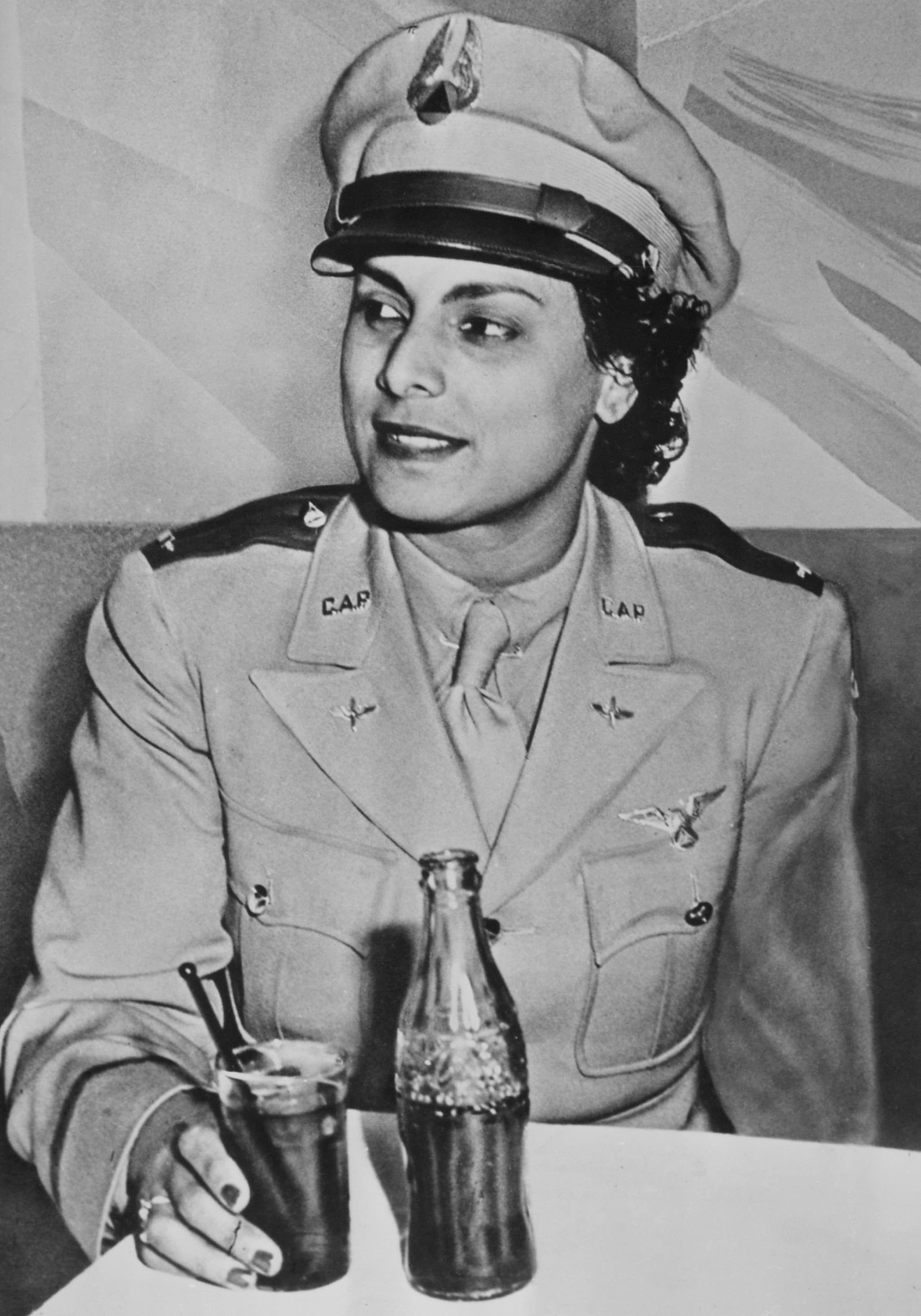 Willa Brown in a Civil Air Patrol lieutenant's uniform, training pilots for the U.S. Army Air Forces.